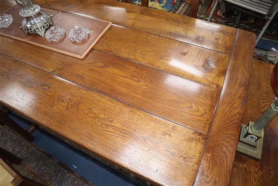 A 17th century style oak refectory style dining table 92 x 244cm